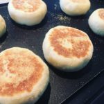 English muffins on the griddle